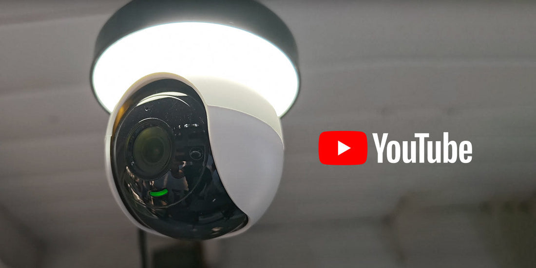 Lorex 2K lightbulb Wi-Fi camera installed in a ceiling socket with YouTube logo, highlighting easy home monitoring and video tutorials.