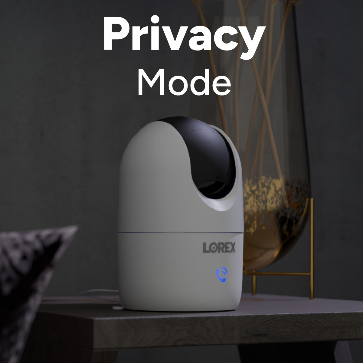 Lorex Connect 2K Wi-Fi indoor pan tilt camera on a table with Privacy Mode text overlay.